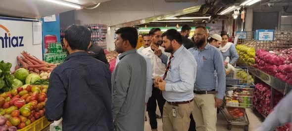 Assistant Commissioners Shah Faisal is conducting market visits